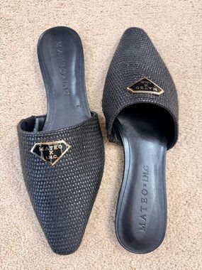Mateo New York Black Woven Pointed Slide Mules with Gold Emblem